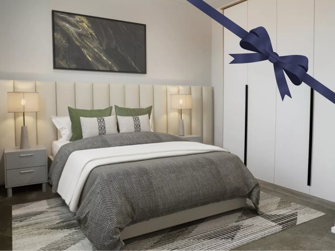 Stylish master bedroom featuring a plush double bed, decorative pillows, side table lamps, and a fitted wardrobe. 