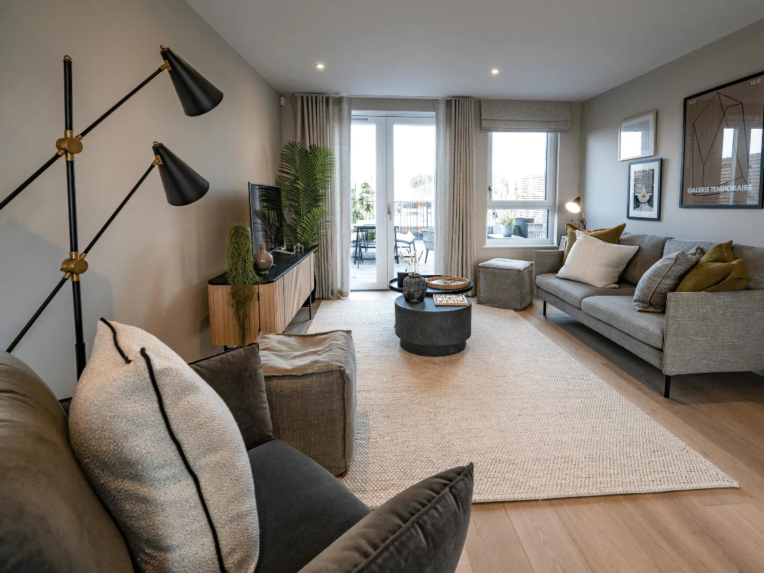 Stylish living room with comfortable seating that leads out to a terrace.