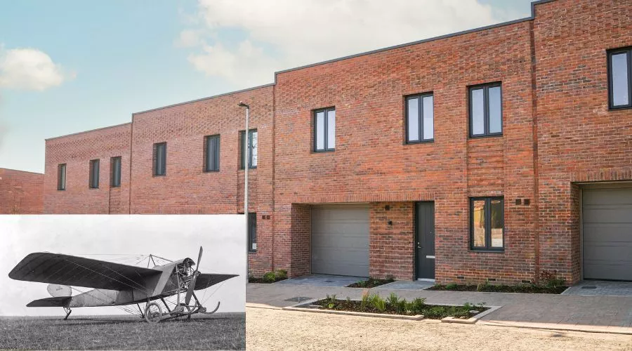 The Prier: a modern brick townhouse at Brabazon, with intricate red brickwork and large picture windows under a partly cloudy sky. An overlay shows a black and white photograph of a Prier biplane.