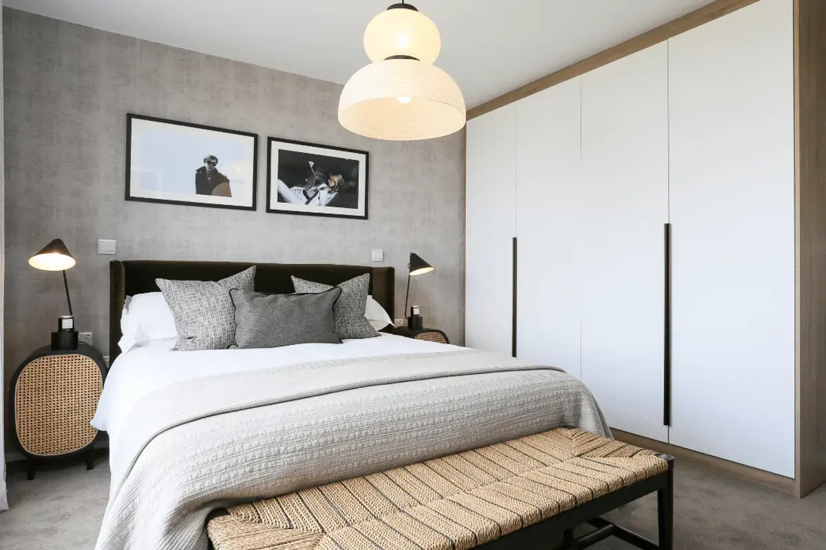 Principal bedroom showcasing a built-in wardrobe, adding functionality and style to the space.