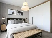 Principal bedroom showcasing a built-in wardrobe, adding functionality and style to the space.
